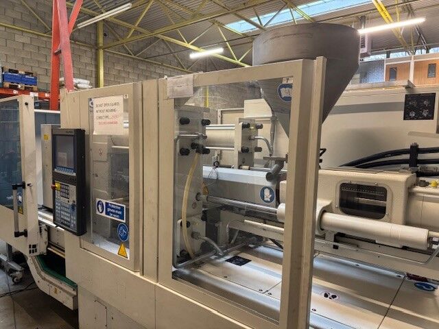 Used KRAUSS MAFFEI CX 110-380 injection moulding machine