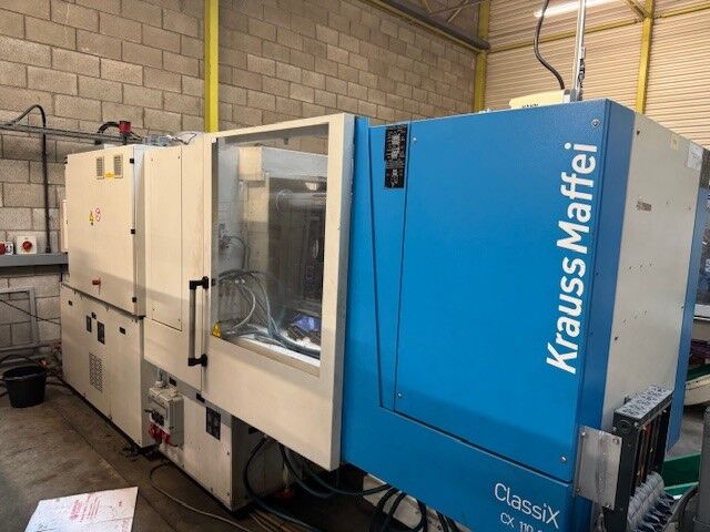 Used KRAUSS MAFFEI CX 110-380 injection moulding machine