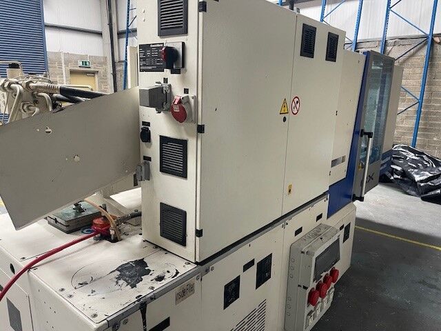 Used KRAUSS MAFFEI CX 80-380 injection moulding machine