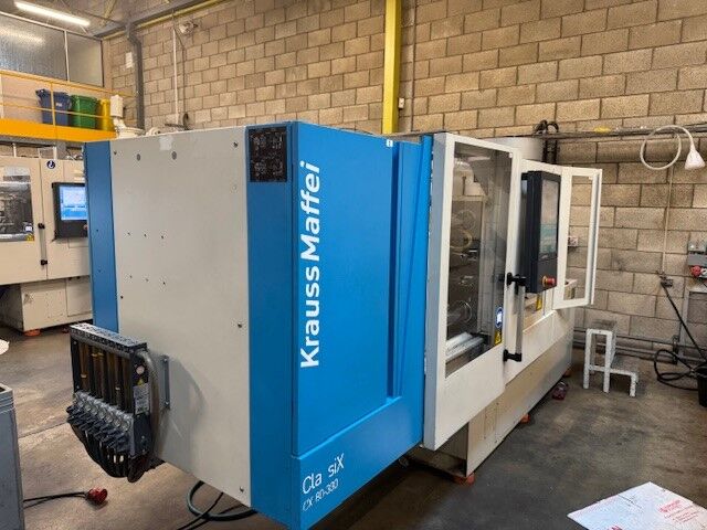 Used KRAUSS MAFFEI CX 80-380 injection moulding machine