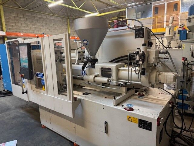 Used KRAUSS MAFFEI CX 80-380 injection moulding machine