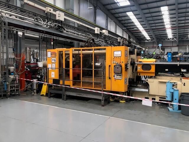 Used HUSKY HYLECTRIC RS 135 / 115 injection moulding machine