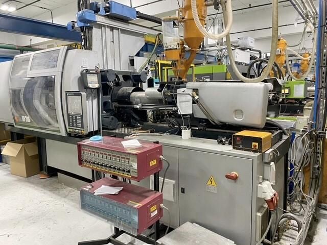 Used SANDRETTO NOVE HP 1300 / 230 injection moulding machine