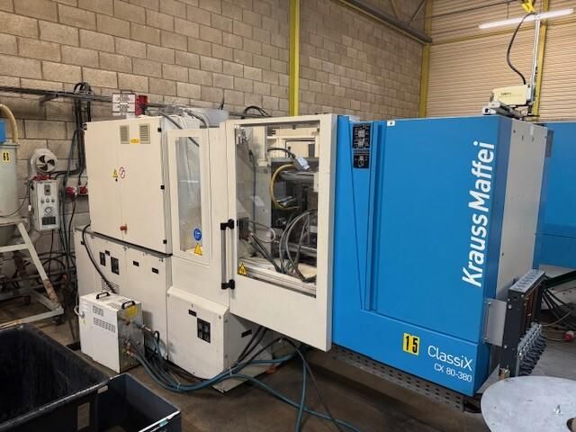 Used KRAUSS MAFFEI CX 80-380 injection moulding machine