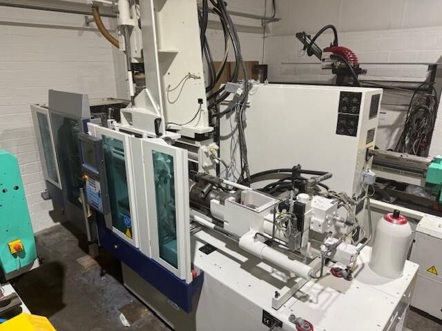 Used KRAUSS MAFFEI CX 2C 80-180-55 CX V injection moulding machine